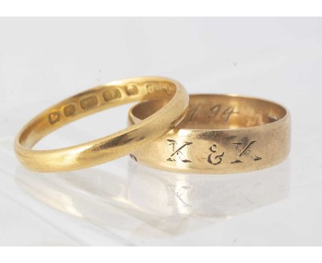 A 22ct gold wedding band,  D shaped, 2.7mm wide, ring size N, 2.6g together with a 9ct gold wedding band, engraved K&K, 4.8mm