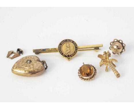 An Edwardian 9ct gold heart shaped locket, with an engraved floral front, centred with a seed pearl, Birmingham 1904, togethe