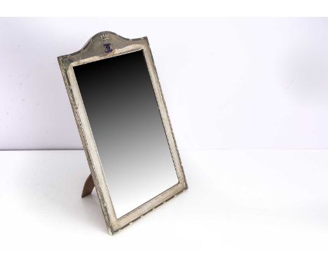 An early 20th century Indian silver table mirror from Hamilton &amp; Co Calcutta, 44cm high and 28cm wide, with wooden back a