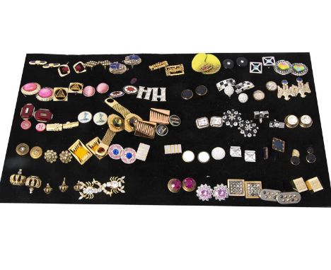 A collection of cufflinks,  including a pair of white metal enamel and scarab examples, a pair of silver and enamel centred w