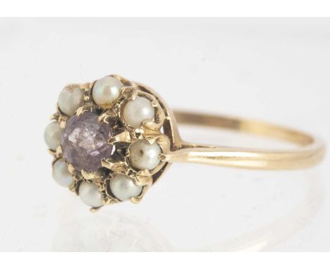 A 9ct gold amethyst and seed pearl dress ring, ring size T, 2.4g