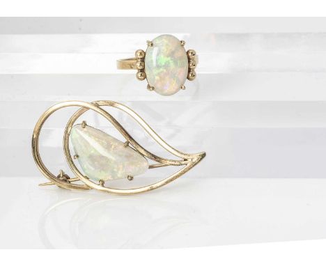 Two opal and gold jewels, including an opal ring with bead setting to the shoulders, on a plain shank, ring size P, marked 9c