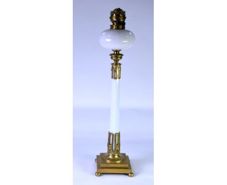 LATE VICTORIAN/EDWARDIAN TALL OIL LAMP, the stepped brass base supporting a column in OPAQUE WHITE GLASS slotting into SECESS