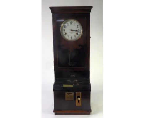 INTERNATIONAL TIME RECORDING CO., LONDON, CLOCKING-IN CLOCK, in varnished oak case, silvered arabic dial, spring driven movem