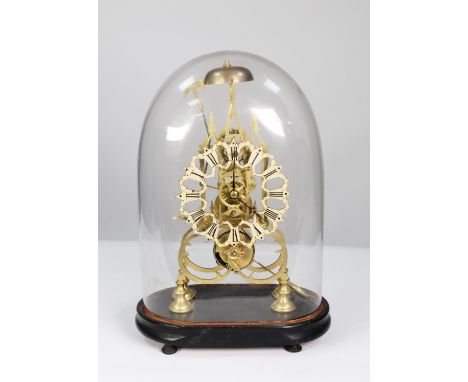 NINETEENTH CENTURY BRASS SKELETON CLOCK, the 6 ¼” pierced and enamelled Roman chapter ring powered by a single fusee movement