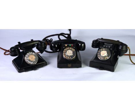THREE BLACK CASED, ROTARY DIAL VINTAGE BAKELITE TELEPHONES, comprising one with four push buttons to connect to 'Extension', 
