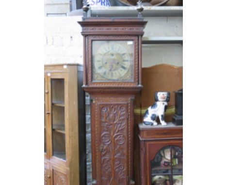 HEAVILY CARVED OAK CASED LONGCASE CLOCK WITH ORMOLU MOUNTED BRASS DIAL BY GABRIEL SMITH, NANTWICH (AT FAULT- WOODWORM)