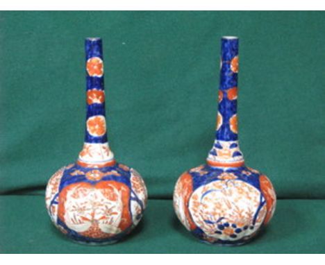 PAIR OF HANDPAINTED AND GILDED IMARI STYLE CERAMIC BUD VASES, APPROXIMATELY 26cm HIGH 