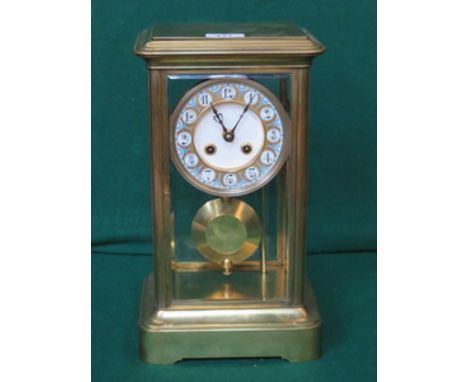 GOOD QUALITY FRENCH STYLE BRASS AND FOUR GLASS CARRIAGE CLOCK WITH GILDED AND ENAMELLED CIRCULAR DIAL, APPROXIMATELY 34cm HIG