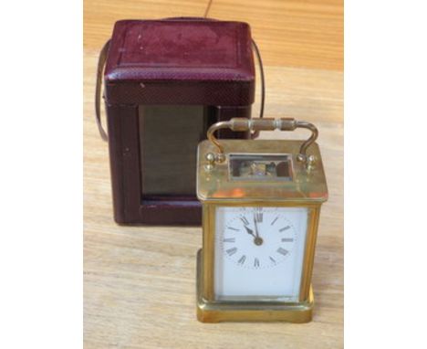 CASED BRASS AND GLASS CARRIAGE CLOCK