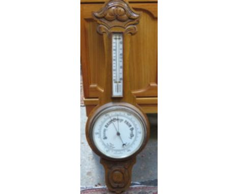 CARVED OAK BAROMETER WITH ENAMELLED DIAL 