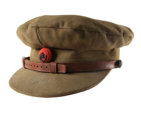 Rifles officer's uniform cap, the strung bugle badge on red cord boss. 