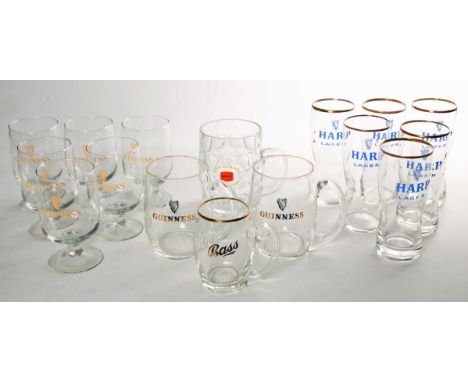 A collection of 1970s and 1980s branded pub glassware, 6 Harp half pint glasses, 6 Guinness half pint glasses, 2 Guinness pin