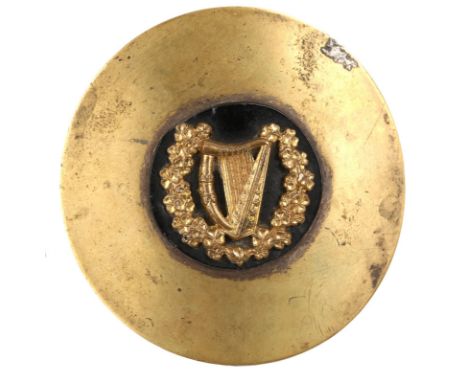 Irish Volunteers / Na Fianna Éireann, piper's cloak pin. A convex brass plate centred by a harp in a shamrock wreath, 3½" (9c