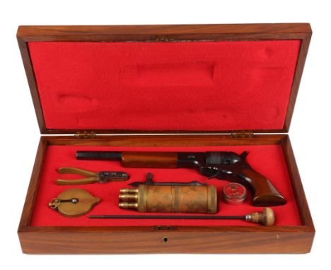 A replica Colt Patterson revolver, in mahogany case with five-nozzle powder flask, bullet mould and tools. Collection of a fi