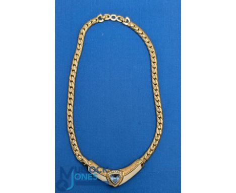 Vintage c1980 Christian Dior Necklace: gold finish with triangle aqua crystal
