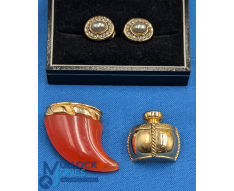 Vintage Christian &amp; Yves Saint Laurent Costume Jewellery: to include a Dior German brooch with clip fixing, a pair of cli