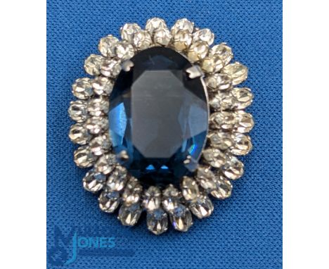 Vintage 1968 Christian Dior Brooch: domed with large centre blue crystal, surrounded by multi crystals – 4.cm diameter, G
