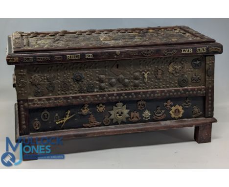 Scare collection of early WWI and Military Title Badges, Cap Badges and Buttons, plus a wooden trunk covered in good early ti