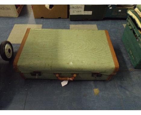 A Vintage Suitcase Containing Books. 