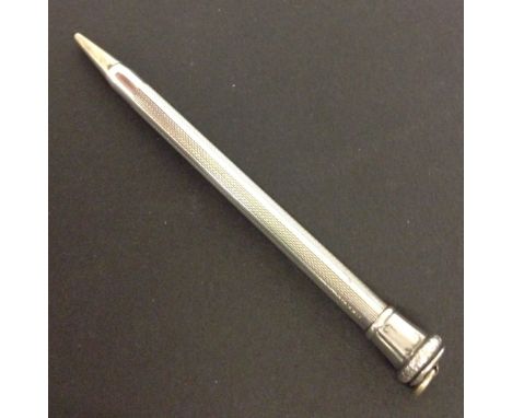 Sterling Silver propelling pencil. Engine turned engraving, 10cm long, approx weight 11.5g.