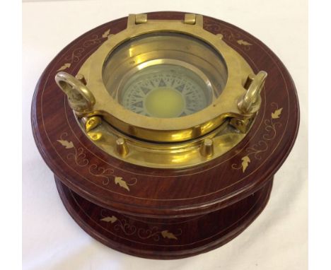 Large W. Ludolph brass gimbal ships compass set into a rosewood mount with brass inlay. Compass size approx 23cm diameter, mo