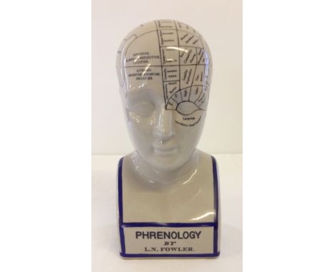 A ceramic phrenology head 29cm tall