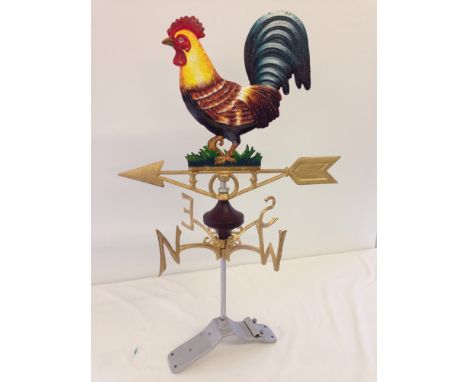 A painted cast iron cockerel weather vane