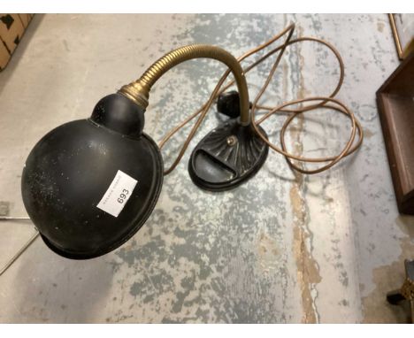 Supreme cast metal base table lamp with flexible angle pose and shade