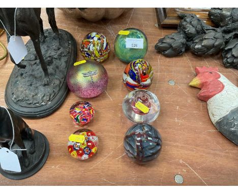Group of eight various art glass paperweights to include Mdina and John Ditchfield (8).