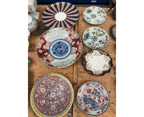 Group of porcelain plates, including a Chinese famille rose dish c.1900, a Chinese Kangxi Imari plate, Royal Worcester tray, 