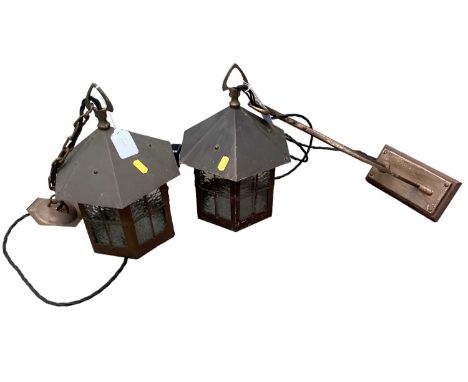 Pair of brass Arts and Crafts style lanterns, one with wall bracket.