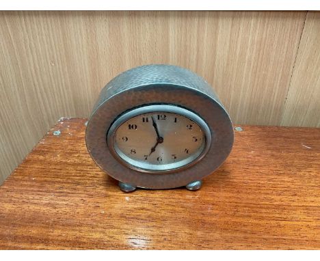 Arts &amp; Crafts Tudric pewter desk clock, with hammered finish, model number 01590