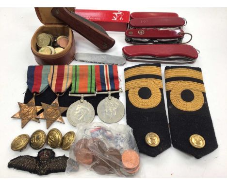 WWII medal group comprising 1939-1945 star, Africa star, Defence and War medals, together with Naval buttons, epaulettes, var