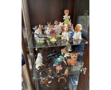 Group of ceramic figures, including Beswick Beatrix Potter and animals, Royal Doulton Bunnykins, Royal Worcester figure, etc