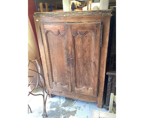 18th century French chestnut armoire, with hanging rail enclosed by two panelled doors on shaped bracket feet, 129cm wide x 5