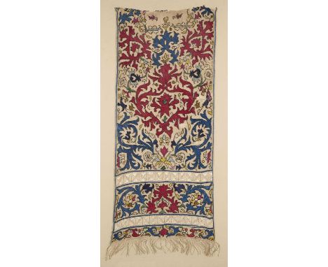 A SILK EMBROIDERED LINEN PANEL, ALGERIA, CIRCA 1850  from a scarf, with elaborate leafy arabesque design in red, dark and lig