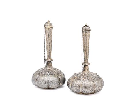 A PAIR OF PARCEL GILT SILVER BOTTLES (SURAHI), LUCKNOW, INDIA, 1860-1880  each with body of pumpkin-shaped form, with tall ge