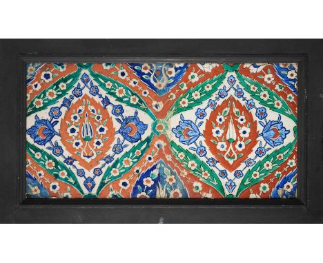 A PAIR OF IZNIK TILES, OTTOMAN ANATOLIA, CIRCA 1570-1580  underglaze painted fritware, with an ogival design of floral leaf m