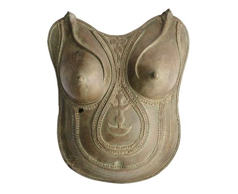 A RITUAL BRONZE FEMALE BREASPLATE, KERALA OR COASTAL KARNATAKA, INDIA, 18TH/19TH CENTURY  the prominent breasts each with a c