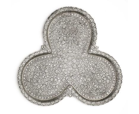 A SILVER TRAY, SRINAGAR, KASHMIR, CIRCA 1890  of trilobed form, decorated in the 'mosaic pattern, with intricate engraved flo