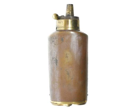 Combination powder flask, for pistol and revolver, brass and copper construction with traps on the base for bullets and caps.