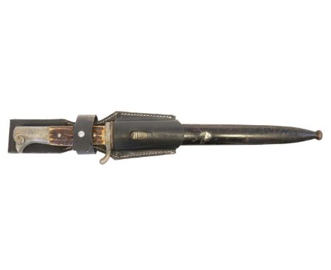 German Third Reich parade bayonet and scabbard, with staghorn grip, he ricasso with makers mark of a Knight's helmet and W.K.