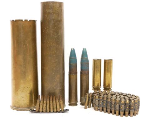 Collection of shells and inert ammunition, including two dummy 30mm rounds, and two empty cases, a clip of eight 7.62x39 roun