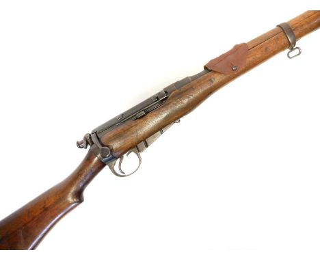 Lee Enfield .303 bolt action L.E.C.I Cavalry Carbine, 20.5inch barrel fitted with folding ladder sights covered by a leather 