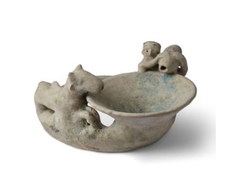 A turquoise glazed ceramic vessel, Central Asia or Iran, circa 1st Millennium A.D., with a shallow bowl surmounting a solid r