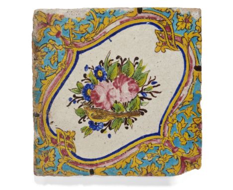 Property from the Estate of Prof. Michael RogersA Qajar pottery tile, Persia, late 19th century, underglaze decorated in yell
