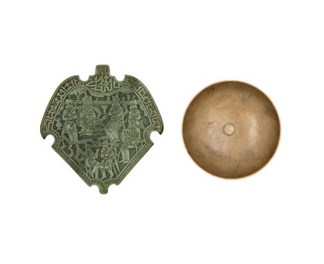 Property from a Private London CollectionA Qajar green stone plaque with a battle scene, 20th century, an interpretation of R