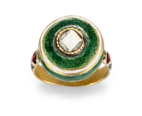 A diamond-set enamelled gold ring, India, 20th century, the bezel of circular form, with a central foil backed diamond surrou