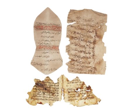  A group of Arabic manuscript fragments, including a 19th-century manuscript model of the Prophet’s sandal inscribed with pra